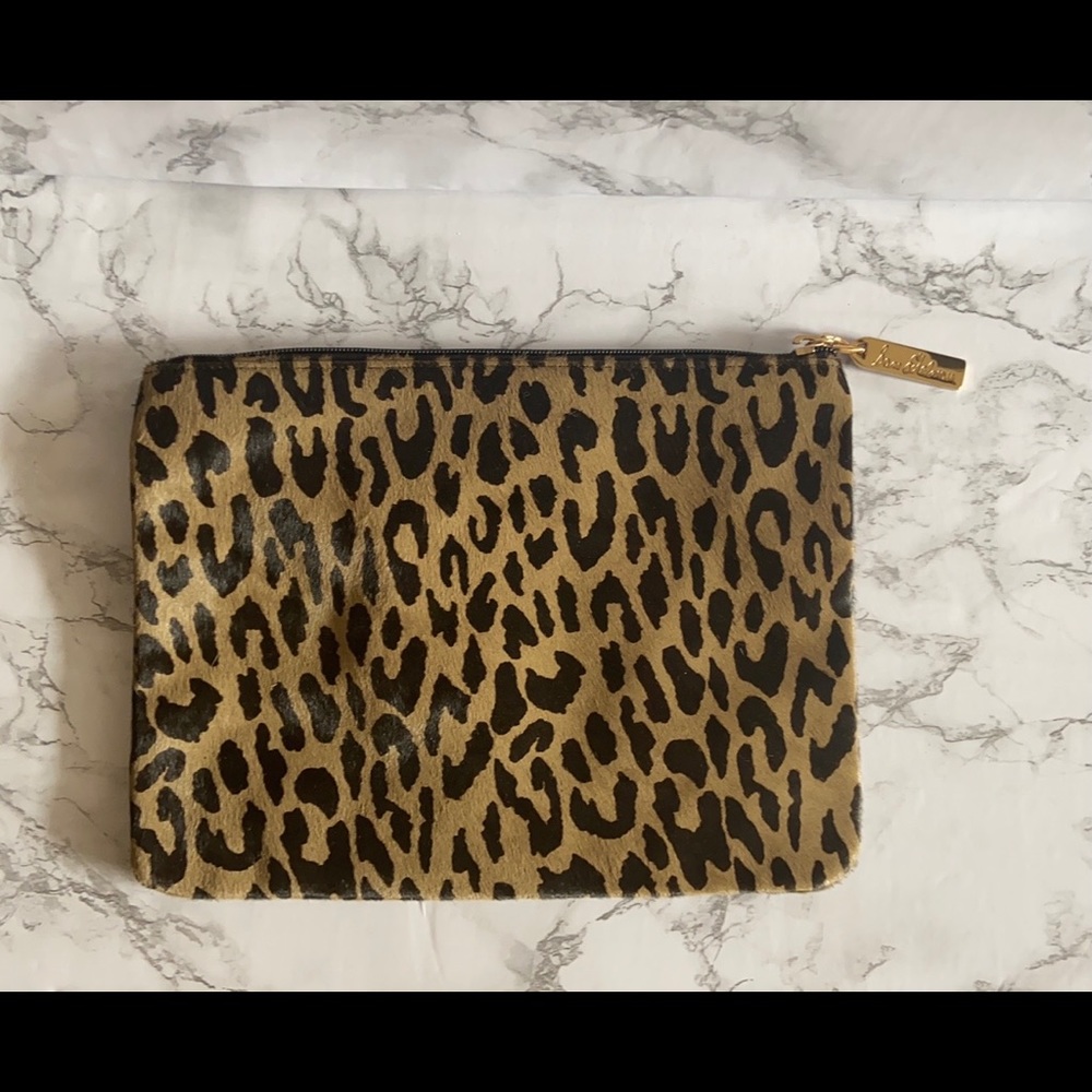 Leopard printed cow hair leather clutch